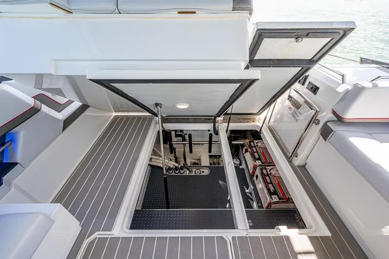 Slide: The Image of 2019 Formula 430 Super Sport Crossover engine compartment with open hatch, showcasing interior components. - 41