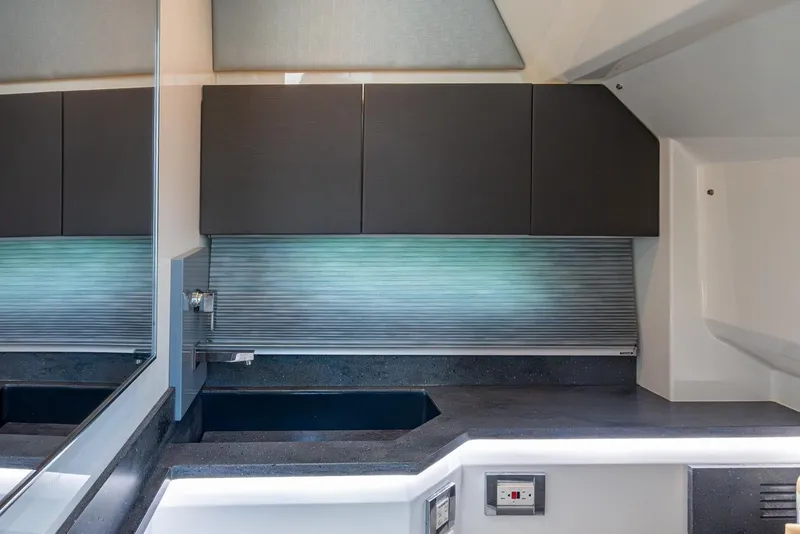 Slide: The Image of 2019 Formula 430 Super Sport Crossover interior with sleek cabinetry and modern design. - 51