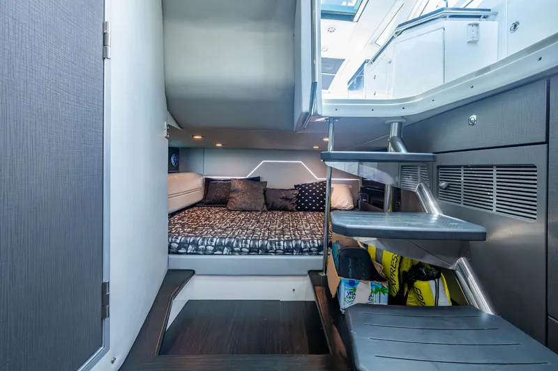 Slide: The Image of 2019 Formula 430 Super Sport Crossover cabin interior with modern design and cozy bedding. - 53