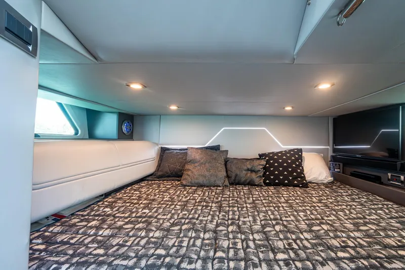 Slide: The Image of Luxurious cabin interior of 2019 Formula 430 Super Sport Crossover with modern bedding and lighting. - 54