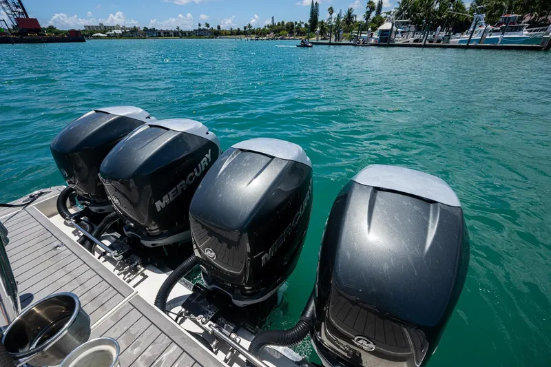 Slide: The Image of Four Mercury outboard engines on a 2019 Formula 430 Super Sport Crossover boat. - 56