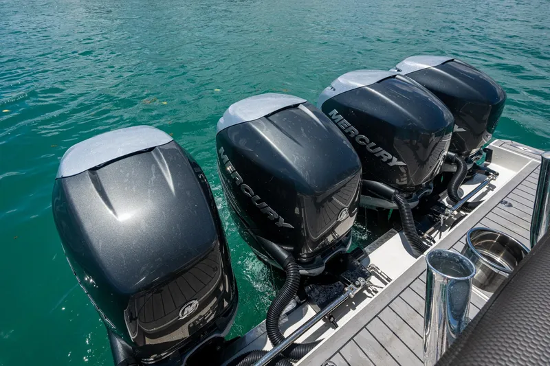 Slide: The Image of Four Mercury outboard engines on a 2019 Formula 430 Super Sport Crossover boat. - 58