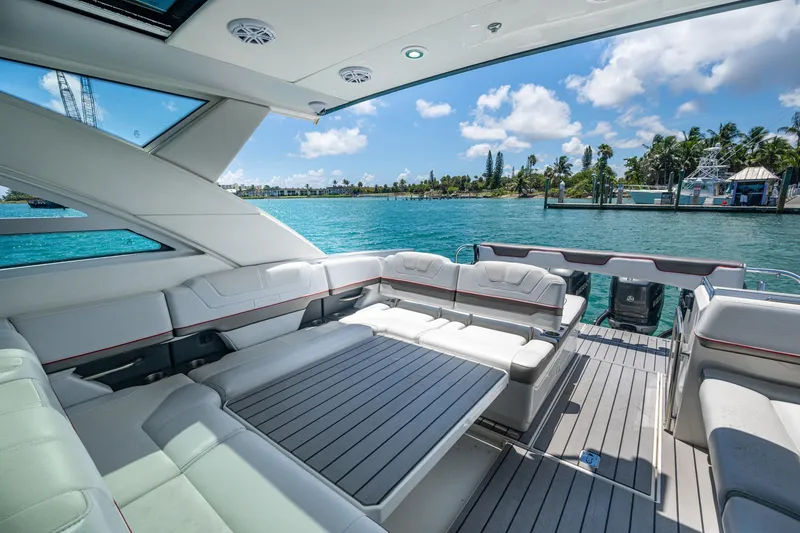 Slide: The Image of Luxurious 2019 Formula 430 Super Sport Crossover yacht interior with spacious seating and scenic water view. - 59