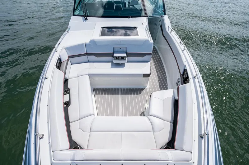 Slide: The Image of 2019 Formula 430 Super Sport Crossover boat with spacious seating on open water. - 6