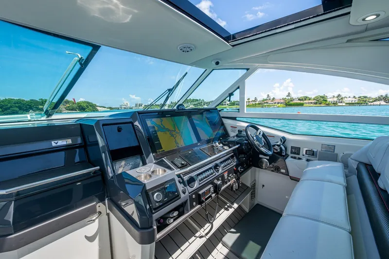 Slide: The Image of 2019 Formula 430 Super Sport Crossover cockpit with advanced navigation system and luxurious seating. - 62