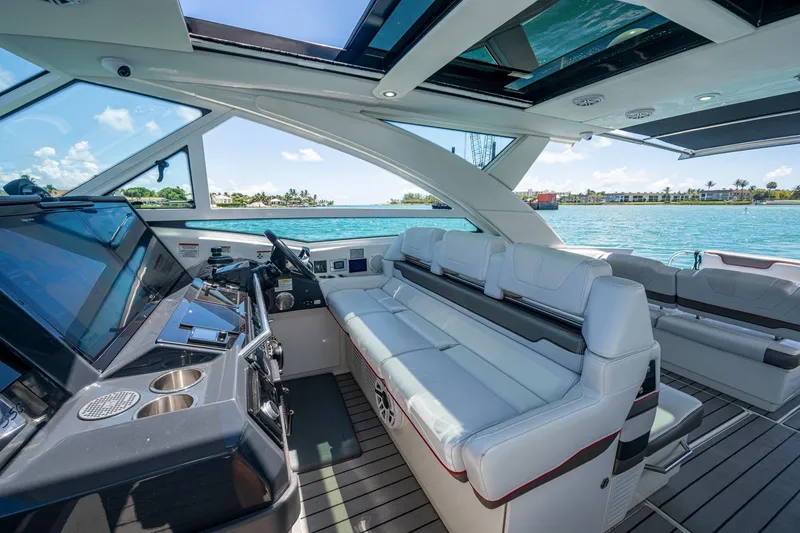 Slide: The Image of Luxurious interior of 2019 Formula 430 Super Sport Crossover yacht with spacious seating and modern controls. - 63