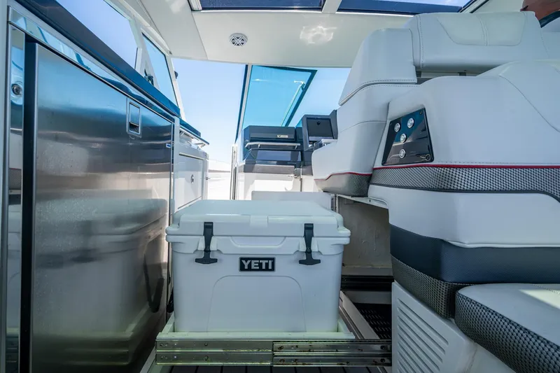 Slide: The Image of Interior of 2019 Formula 430 Super Sport Crossover with Yeti cooler and modern seating. - 66
