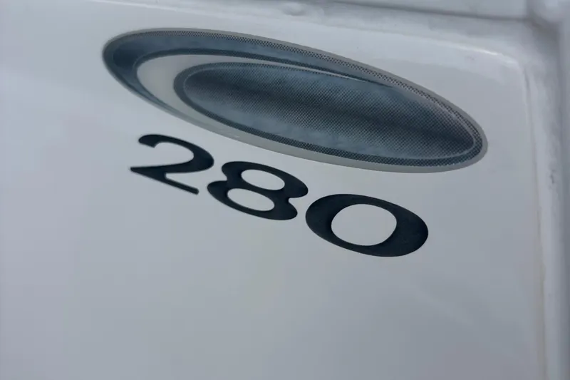 Slide: The Image of Close-up of 2022 Cobia 280 Center Console boat model number. - 6
