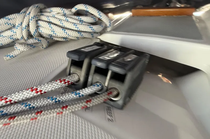 Slide: The Image of Rope clutches and lines on a 1998 Hunter 34 sailboat deck. - 19