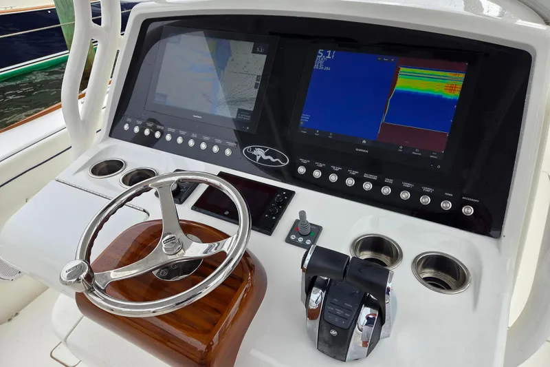 Slide: The Image of Valhalla Boatworks V-33 2021 helm with advanced navigation and control systems. - 5