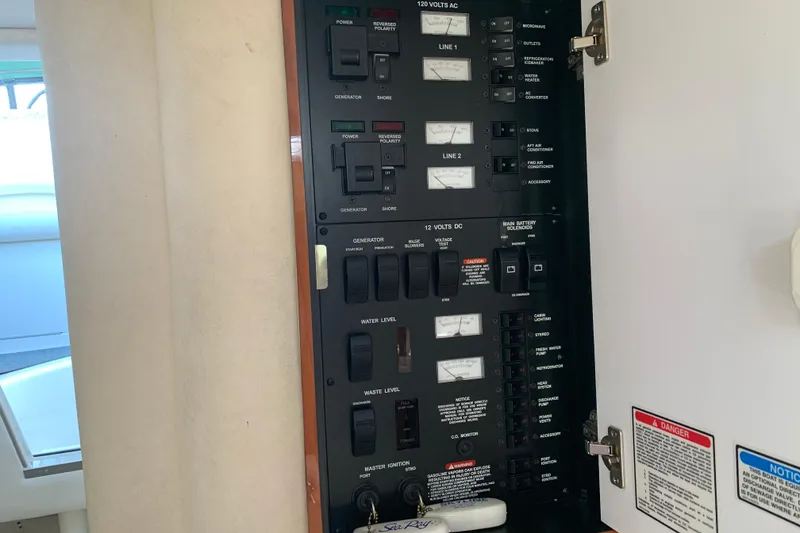 Slide: The Image of Electrical control panel on a 2001 Sea Ray 340 Sundancer boat. - 20
