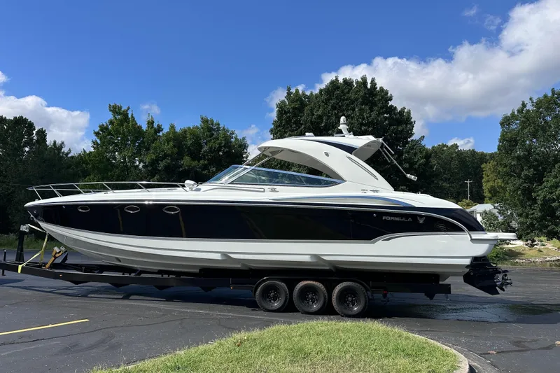 Slide: The Image of Engine compartment of a 2008 Formula 400 Super Sport boat with twin MerCruiser engines. - 12
