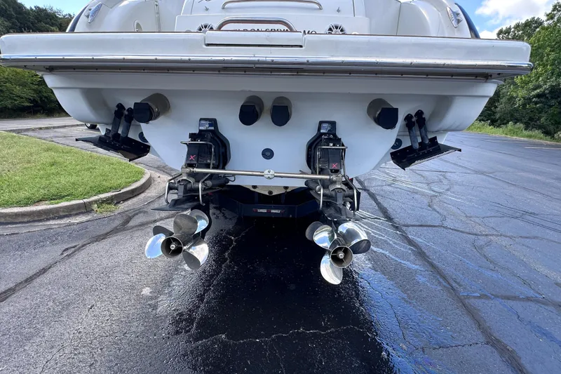 Slide: The Image of Rear view of 2008 Formula 400 Super Sport boat with dual propellers and MerCruiser engines. - 13