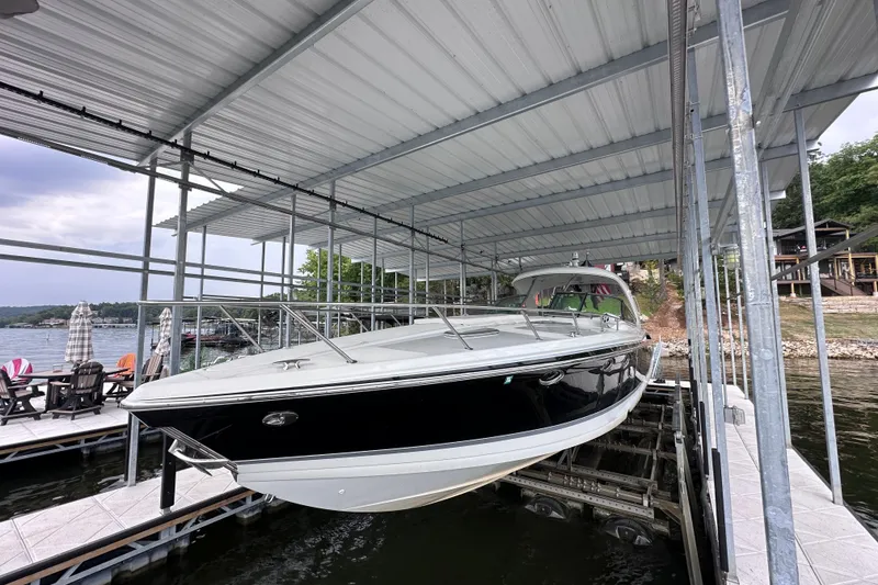 Slide: The Image of Luxurious interior of a 2008 Formula 400 Super Sport yacht with elegant seating and wood flooring. - 16