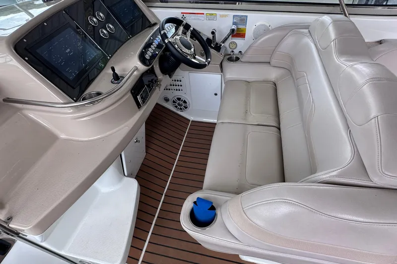 Slide: The Image of Luxurious interior of 2008 Formula 400 Super Sport yacht with kitchenette and seating area. - 22