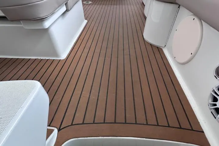 Slide: The Image of 2008 Formula 400 Super Sport yacht interior with plush seating, kitchenette, and modern amenities. - 23