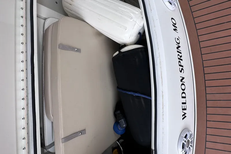 Slide: The Image of 2008 Formula 400 Super Sport yacht bathroom with sink, toilet, and storage cabinets. - 25