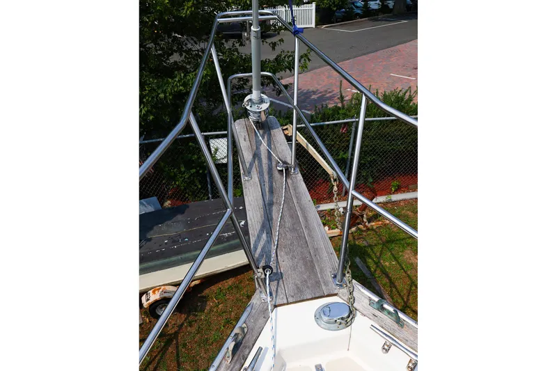 Slide: The Image of Bow view of 1985 Island Packed 31 yacht with stainless steel railings. - 8