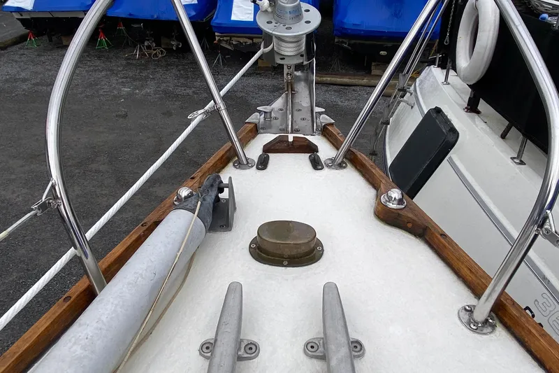 Slide: The Image of 1972 Bristol 40 sailboat deck with stainless steel fittings and wooden trim. - 22
