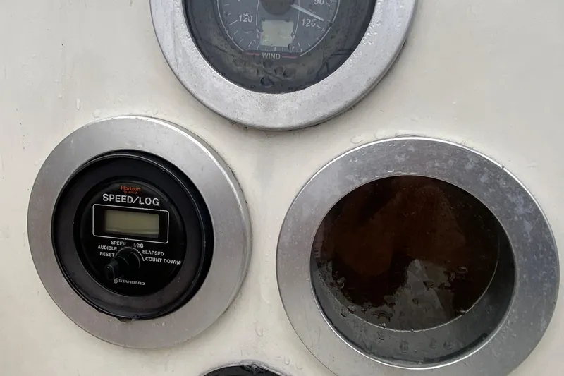 Slide: The Image of Close-up of 1972 Bristol 40 yacht instruments, featuring speed/log and wind gauges. - 31