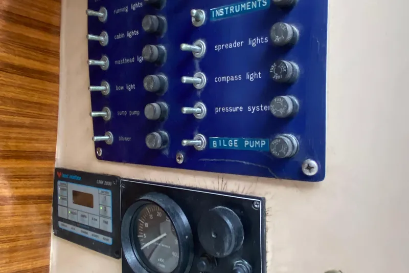 Slide: The Image of Control panel of a 1972 Bristol 40 boat with switches and gauges. - 36