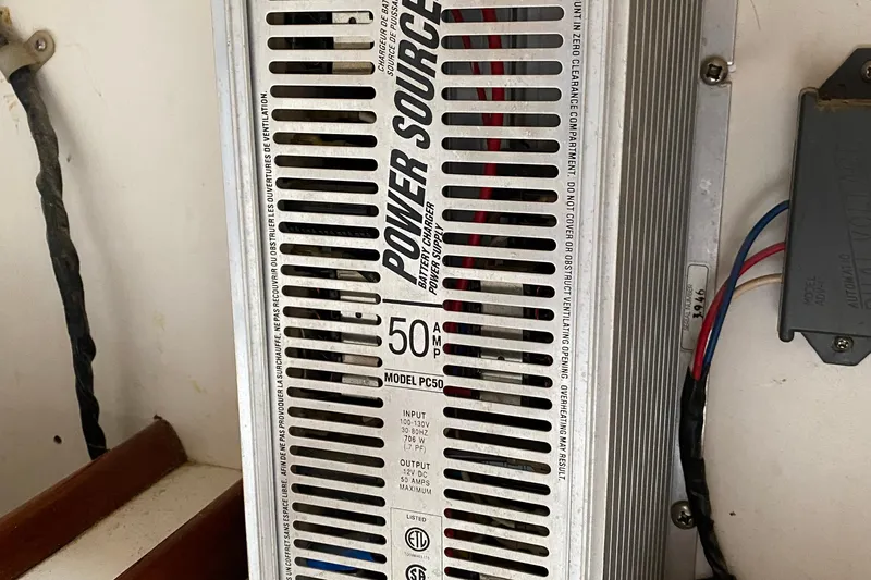 Slide: The Image of 1972 Bristol 40 power source battery charger, model PC50, with wiring connections. - 41