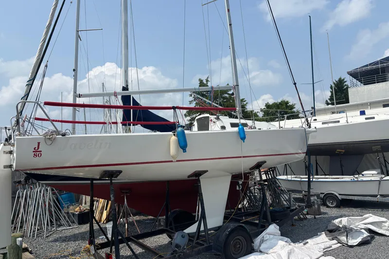 Slide: The Image of 1993 J Boats J/80 sailboat on dry dock, ready for maintenance. - 1