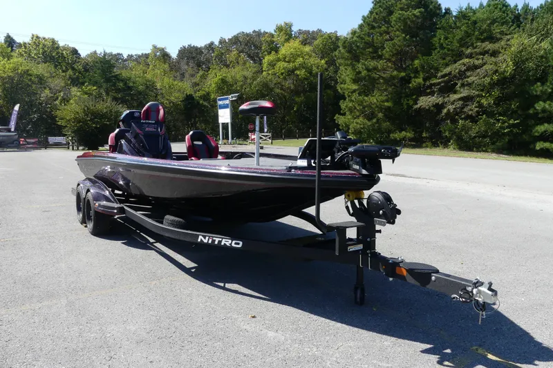 Slide: The Image of 2026 Nitro Z21 XL Pro boat on trailer in outdoor setting. - 82