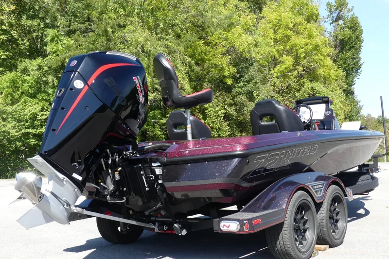 Slide: The Image of 2026 Nitro Z21 XL Pro boat with powerful engine, parked outdoors. - 83
