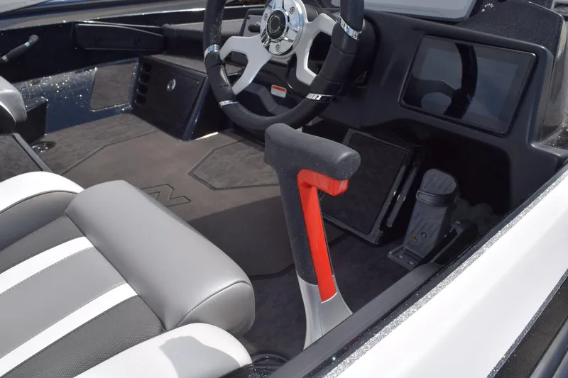 Slide: The Image of 2026 Nitro Z21 XL Pro boat interior with steering wheel and modern controls. - 4