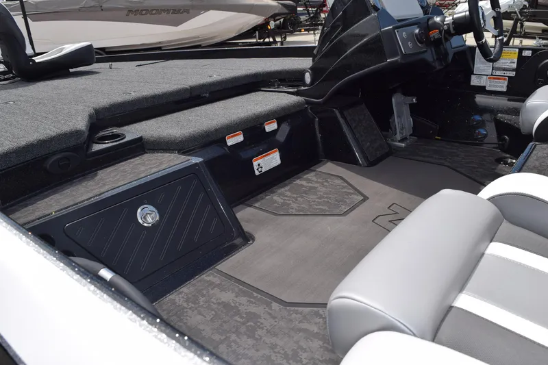 Slide: The Image of 2026 Nitro Z21 XL Pro boat interior with sleek seating and storage compartments. - 8