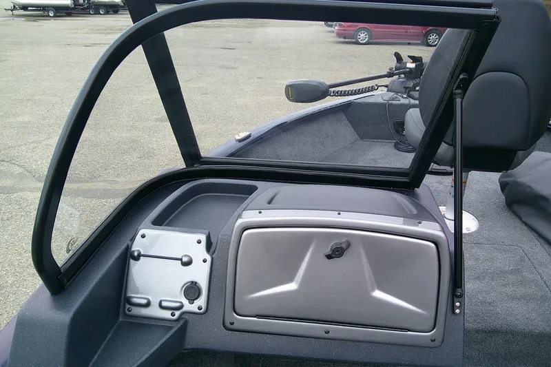Slide: The Image of 2026 Tracker Pro Guide V-175 WT boat interior with windshield and control panel. - 5