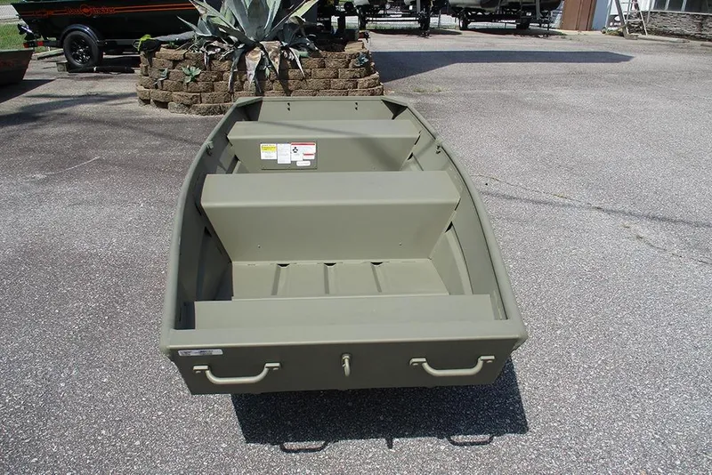 Slide: The Image of 2026 Tracker Grizzly 12 Jon boat in a parking lot, showcasing its sturdy design. - 4