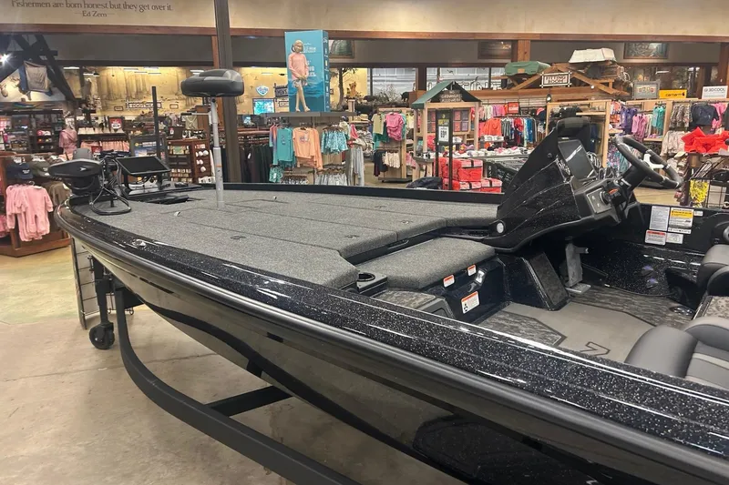 Slide: The Image of 2026 Nitro Z21 XL Pro boat displayed in a retail store setting. - 84