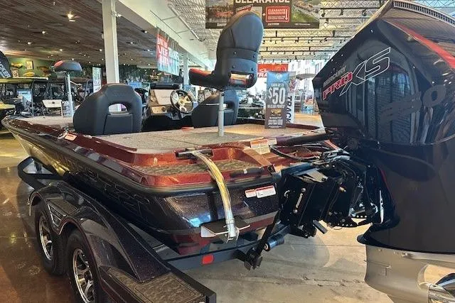 Slide: The Image of 2026 Nitro Z21 XL Pro boat displayed in showroom, featuring powerful engine and sleek design. - 3