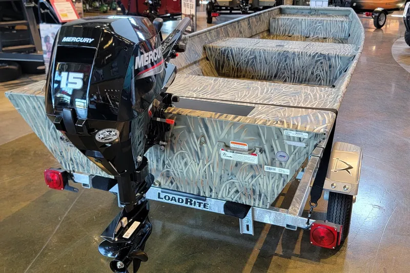 Slide: The Image of 2026 Tracker Grizzly 15 Jon boat with Mercury 15 engine on Load Rite trailer. - 2