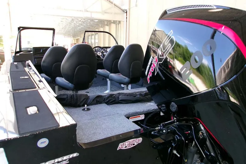 Slide: The Image of 2026 Tracker Targa V-18 WT boat interior with Mercury Pro XS 200 engine. - 15