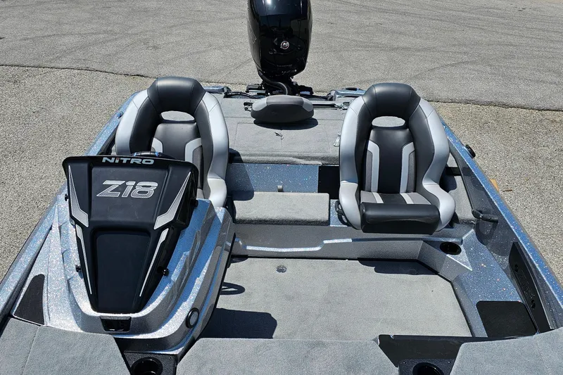 Slide: The Image of 2026 Nitro Z18 Pro boat interior with dual seats and sleek design. - 5