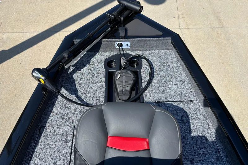 Slide: The Image of 2026 Tracker Pro Team 175 boat interior with seat and trolling motor. - 3