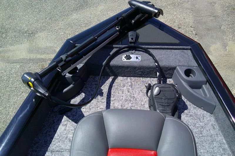 Slide: The Image of 2026 Tracker Pro Team 175 Crappie Edition boat interior with trolling motor and seating. - 7