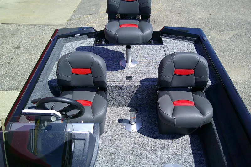 Slide: The Image of 2026 Tracker Pro Team 175 Crappie Edition boat interior with four cushioned seats. - 9