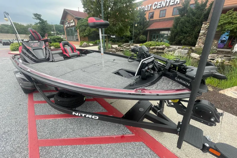 Slide: The Image of 2026 Nitro Z21 XL Pro boat with powerful engine at Outdoor World. - 2