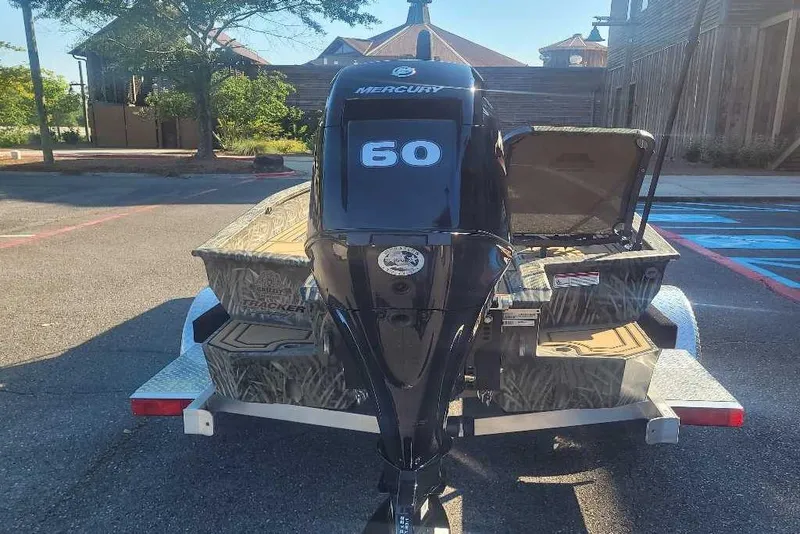 Slide: The Image of 2026 Tracker Grizzly 1650 T Prairie Wings Edition boat with Mercury 60 engine. - 4