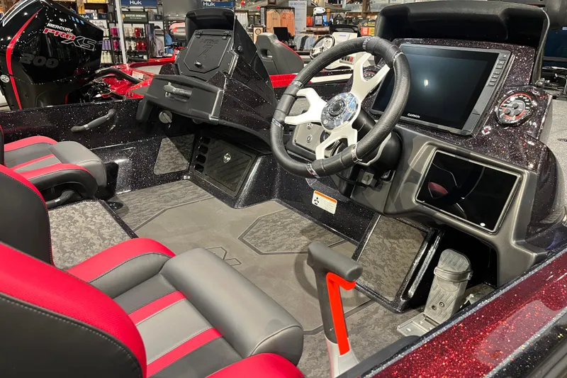 Slide: The Image of 2026 Nitro Z21 XL Pro boat interior with modern dashboard and steering wheel. - 4