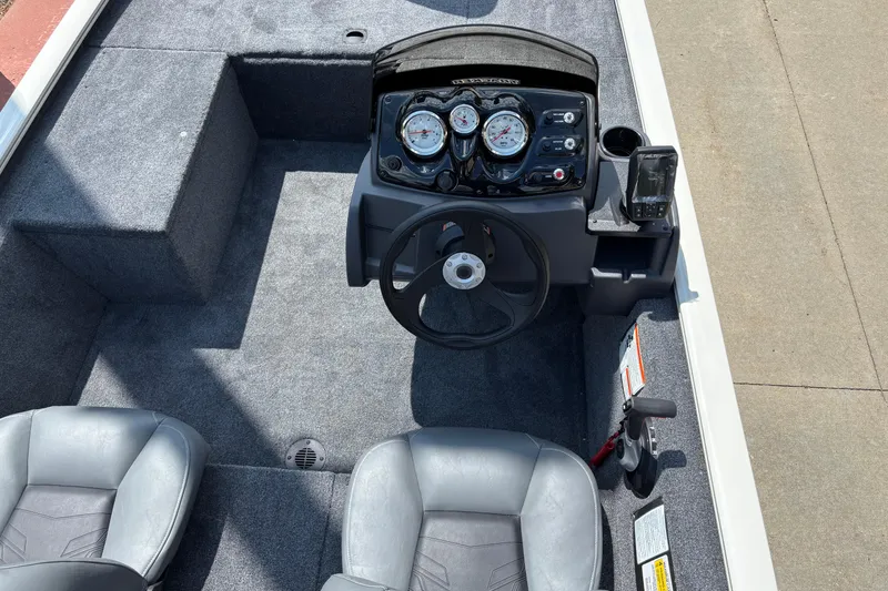 Slide: The Image of 2026 Tracker Pro 170 boat interior with steering wheel and dashboard controls. - 5