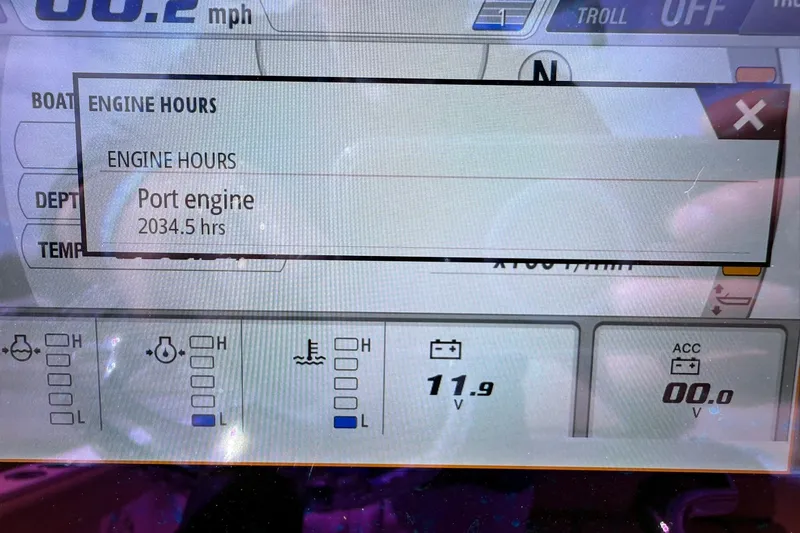 Slide: The Image of Display screen showing engine hours for 2018 Sportsman Open 232 Center Console, port engine 2034.5 hours. - 8