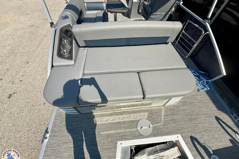 Slide: The Image of 2024 Bennington 22 LSB pontoon boat with spacious seating and cup holders. - 10
