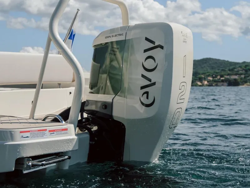 Slide: The Image of Axopar AX/E 22 T-Top with Evoy 120 electric motor on water. - 1