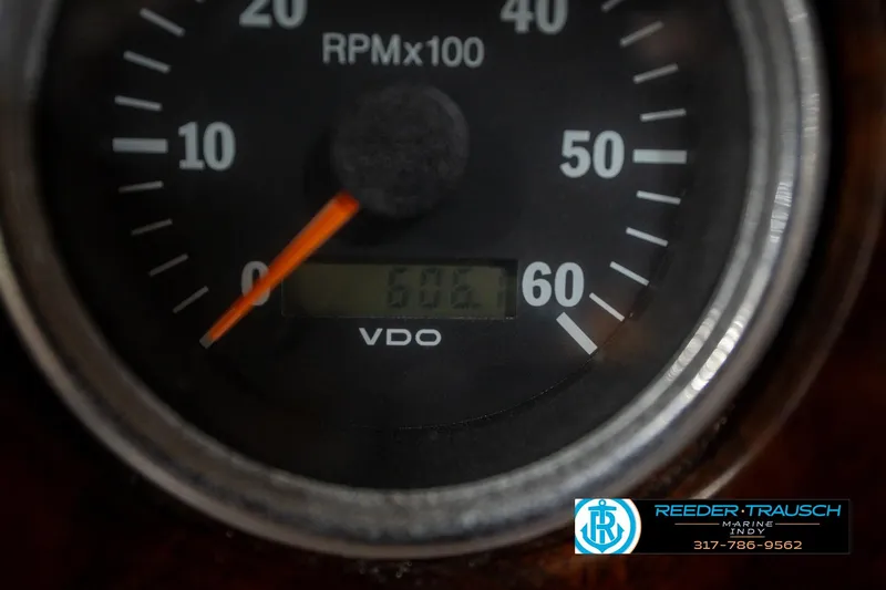 Slide: The Image of Close-up of a Bryant 196 Limited 2000 RPM gauge displaying 605.1 hours. - 33