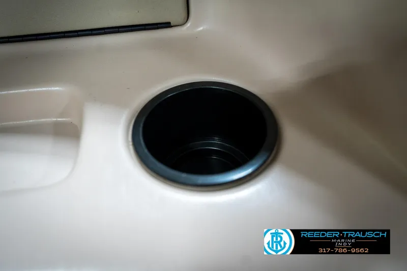 Slide: The Image of Cup holder in 2000 Bryant 196 Limited boat interior, beige finish. - 40